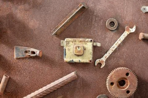 Old, dirty tools against rusty metallic surface  Tool series. Stock Photos