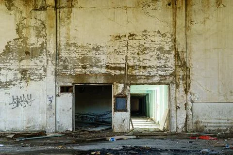Old dirty wall inside the big hall Stock Photos