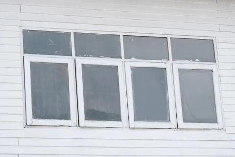 Old dirty window on old dirty wall Stock Photos