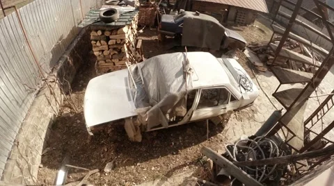 Old Disassembled Car Stand in Backyard of House Stock Footage 60455875