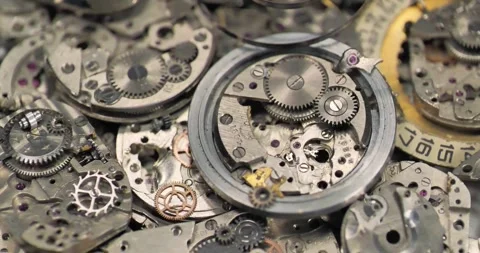 Old disassembled mechanical wrist watch. Metal parts of old mechanical watch Stock Footage 252190351
