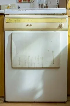 Old dishwasher in a kitchen Stock Photos