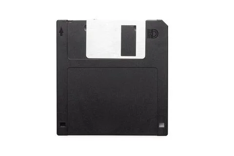 Old diskette or floppy disk for store information on retro computers isolated Stock Photos