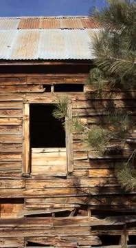Old distressed barn wall window Stock Photos