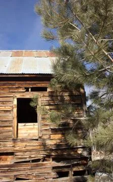 Old distressed barn wall window Stock Photos