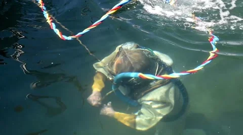 An old diver plunges Video stock 63931214