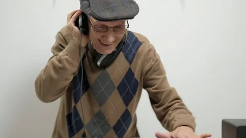 Old DJ scratching on a turntable Stock Footage 80676493