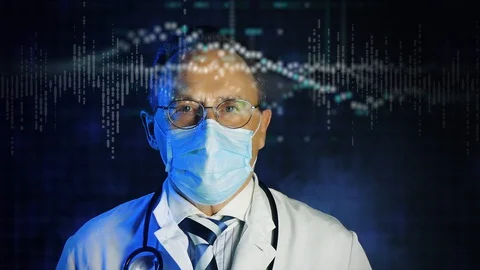 Old doctor in mask looking at augmented reality screen Stock Footage 129304612