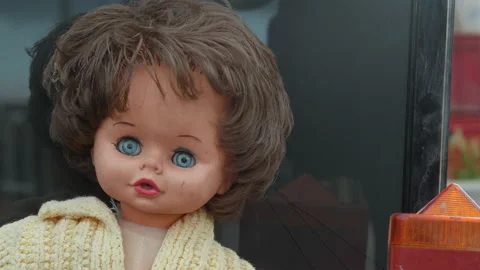 Old doll at the flea market Stock Footage 169935743