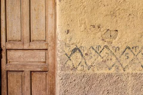 An old door and patterned wall near Cusco, Peru Stock Photos