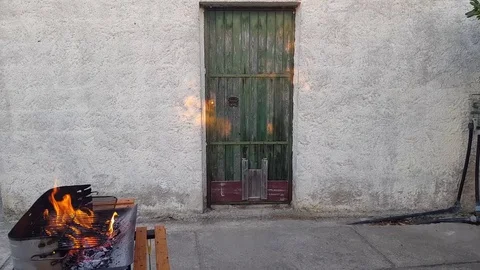 Old Door with barbecue Stock Footage 79075102