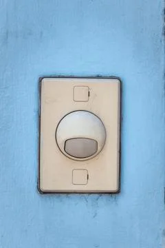 Old door bell switch button Stock Photos