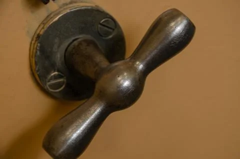 Old door handle from the cabinet Stock Photos