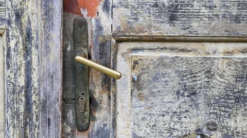 Old Door handle, close up. Old rusty door handle and key lock Stock Footage 243228887