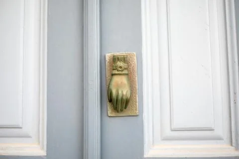 Old door handle in a typical painted blue on the of Santorini Stock Photos