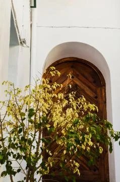 Old door with interesting texture, element of architecture, interesting entra Stock Photos
