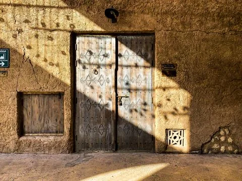 Old Door With Light Patterned Shadows Stock Photos