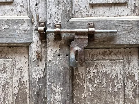 Old door lock, old rusty padlock on door Stock Photos