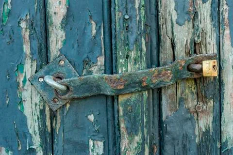 Old door with padlock Stock Photos