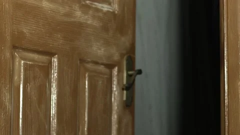Old door slowly opening into old dark room Video stock 238371202