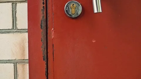 Old door with visible damage being prepared for restoration 動画素材 344670859