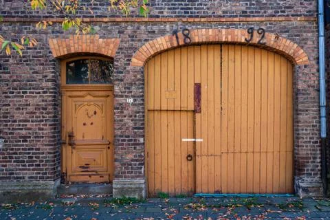 Old door in wall Stock Photos