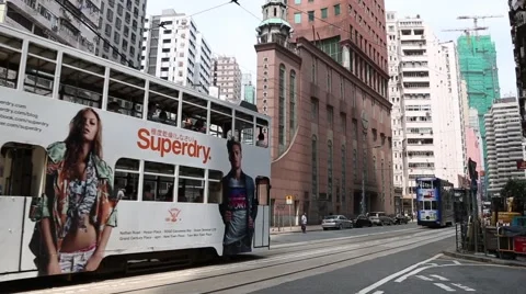 Old double-decker trams on the Queensway, Hong Kong. Stock Footage 50422116