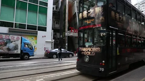 Old double-decker trams on the streets of the metropolis, Hong Kong Stock Footage 50570222
