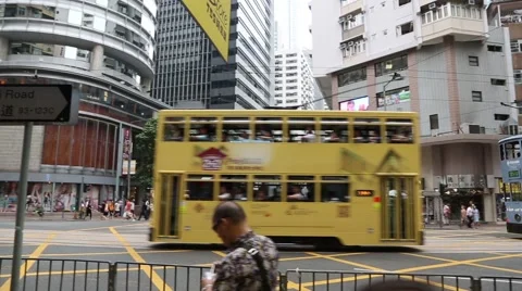 Old double-decker trams on the Wan Chai Road in Hong Kong Stock-Footage 50445385