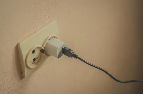 Old double wall-built electrical outlet. Background, selective focus Stock Photos