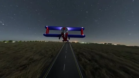 Old Double-wing Plane Taking Off on the Runway at Night Stock Footage 329883144