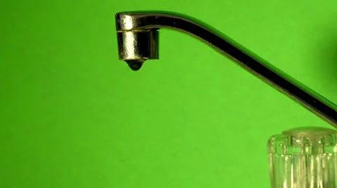 Old dripping faucet on green screen Stock Footage 24755074