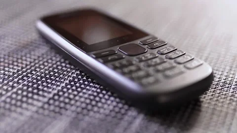 Old dumbphons closeup. Digital minimalism concept. Stock Footage 300592848