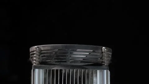 Old, dusty CPU cooler on a black background. vertical movement Stock Footage 131094833