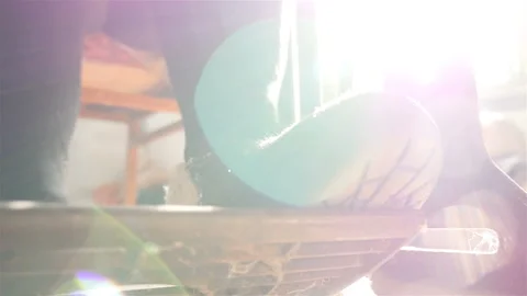 An old dusty sewing machine. Female legs, close-up. Slow motion Stock Footage 89099587