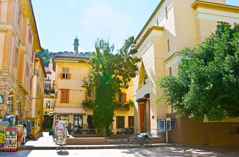 The old edifices of Syntagma Square and stone Clocktower of Acronauplia castl Stock Photos