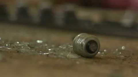 Old electric lamp broken by boot Stock Footage 60616206