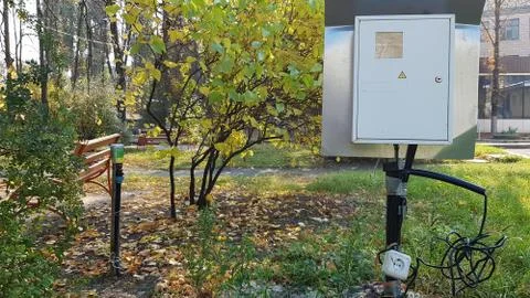 Old electric panel on the street. Outdated electrical equipment. Without peop Stock Photos