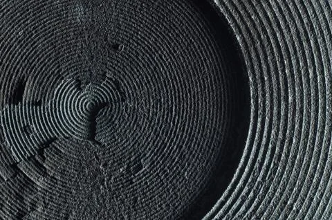 Old electric range solid metal disc heating element. Damaged and peeling. Mac Stock Photos