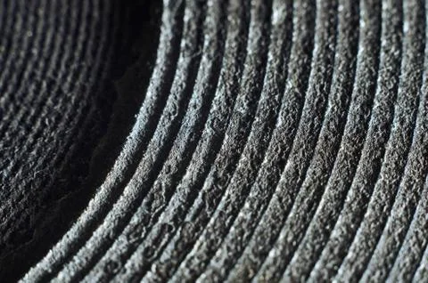Old electric range solid metal disc heating element. Damaged and peeling. Mac Stock Photos