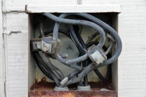 Old electrical connect panel or box on outside of building Foto stock