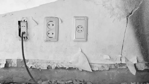 Old Electrical Outlets on Damaged Wall at Reconstruction Site Stock Footage 333347293