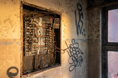 An Old Electrical Panel in an Abandoned Building Stock Photos