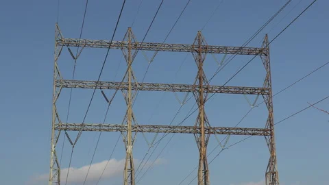 Old electrical power grid transmission grid infrastructure towers and lines Stock Footage 149428817