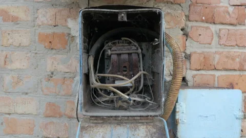 Old electrical shield with on-off switch, circuit breaker and  electrical wires Stock Footage 90665825