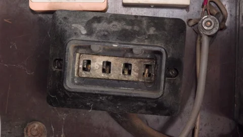 Old electrical socket or connector in dusty industrial condition Stock Footage 333296707