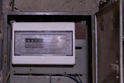 Old electricity meter in the basement Stock Photos