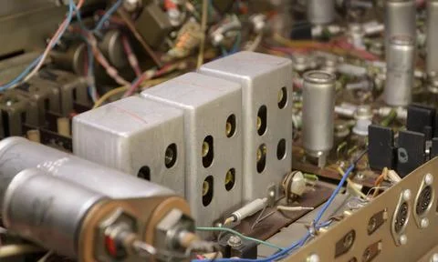 Old electronic device radio receiver with a radio electronic components insid Stock Photos