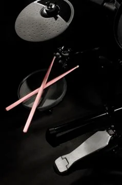 Old electronic Drum Kit and pink drumsticks Stock Photos