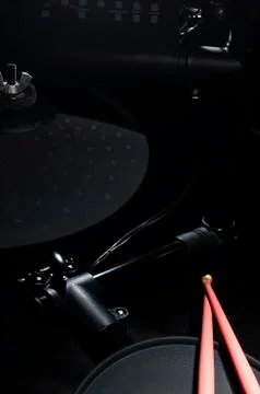 Old electronic Drum Kit and pink drumsticks Stock Photos